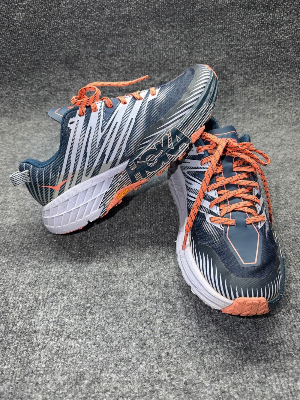 Hoka One One Navy and Orange Speedgoat Trail Sneakers